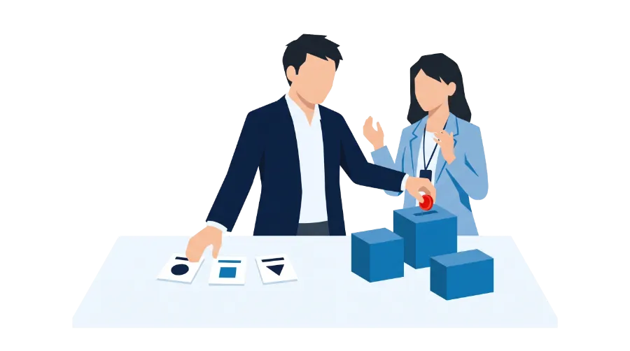 カードから選んだものを箱に入れる男女のイラスト。ベンダーや費用の使い道を自分たちで選ぶイメージ